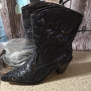 Black Heeled Boots with Intricate Embroidery